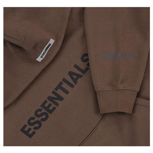 Beige Fog Zip Up Essentials Hoodie The Beige Fog Zip Up Essentials Hoodie is made from 100% cotton, providing ultimate comfort and breathability. Its high-quality fabric ensures a soft and cozy feel against the skin. With its relaxed fit and adjustable drawstring hood, it offers a perfect balance between style and practicality. The kangaroo pocket adds functionality, allowing you to keep your essentials close at hand. Whether you’re lounging at home or stepping out for a casual outing, this hoodie is a versatile and timeless choice. The 100% cotton construction makes it a reliable option for all-day comfort. Stay cozy and effortlessly stylish with the Essential Hoodies, a must-have addition to any wardrobe. Product details: Brand: Essentials Material: 80%Cotton, 20%Polyester,  Color: Gray, White, Black, Pink, Dark , No Color Fading Style Pullover The best option in winter to warm your body Top Quality Print Lightweight and comfortable Style Casual